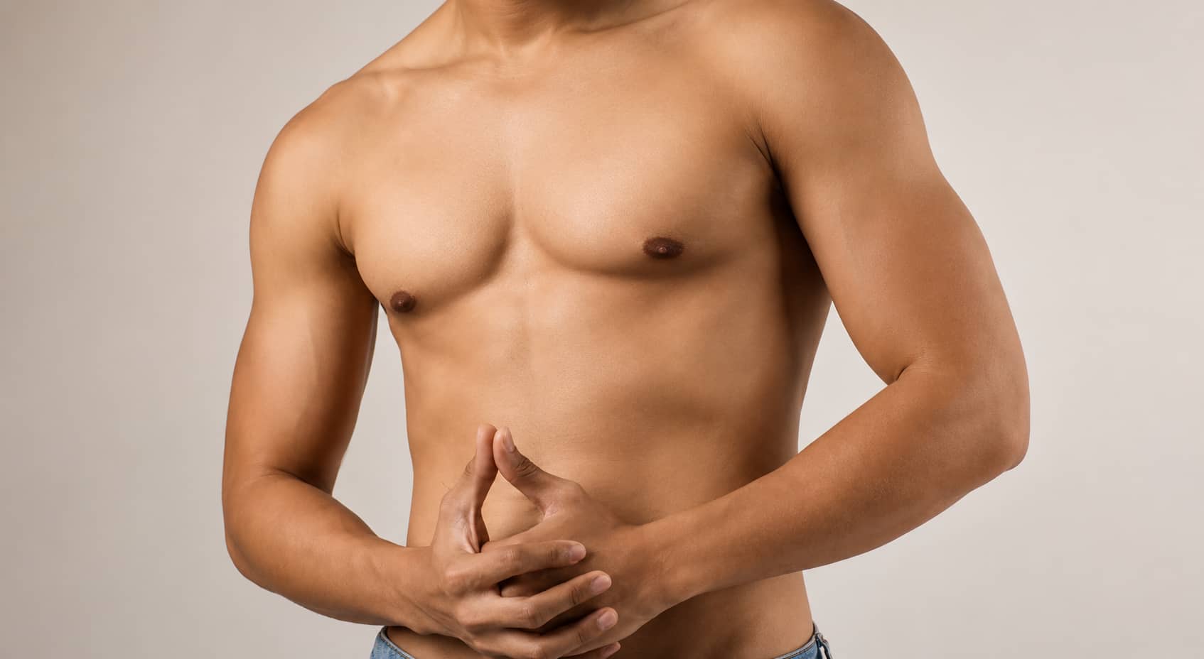 Gynecomastia: Why do men develop enlarged breasts and how can it be effectively treated?